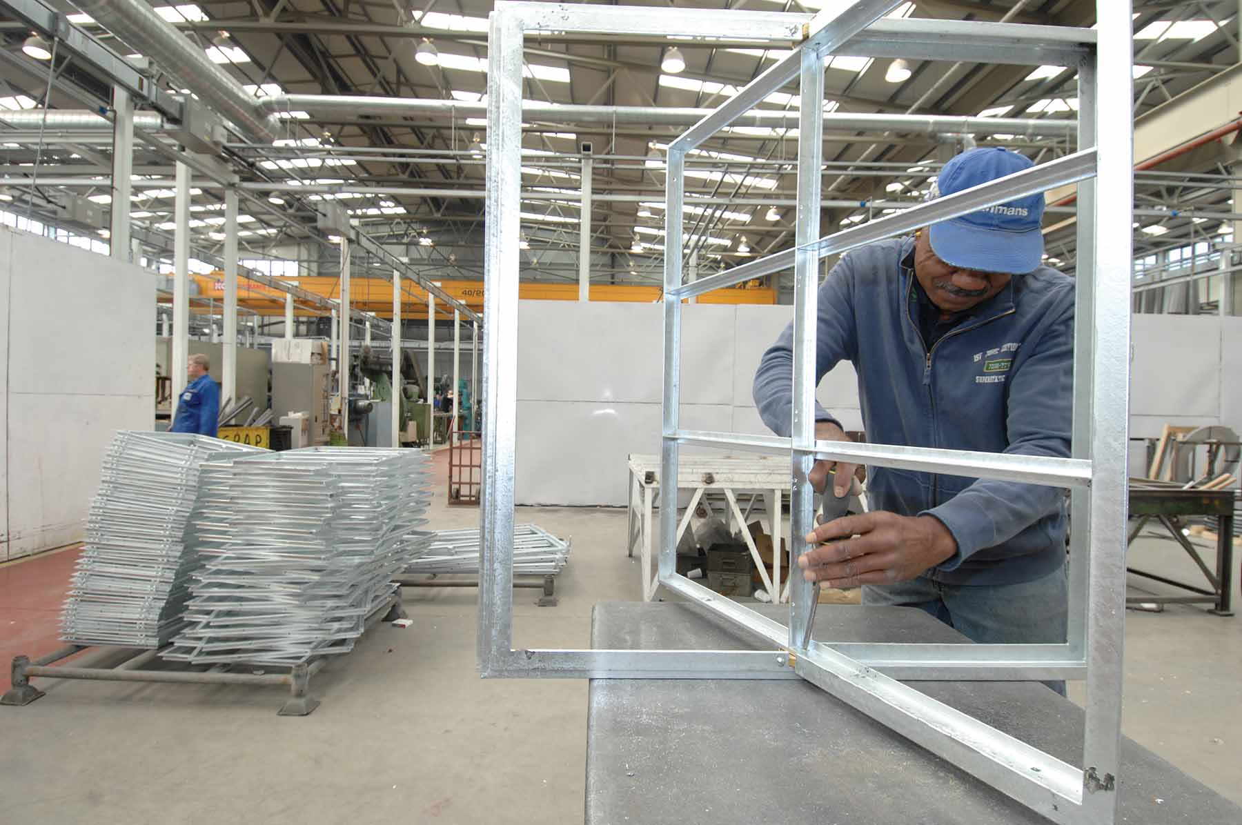 Crittall employee manufacturing new aluminium windows